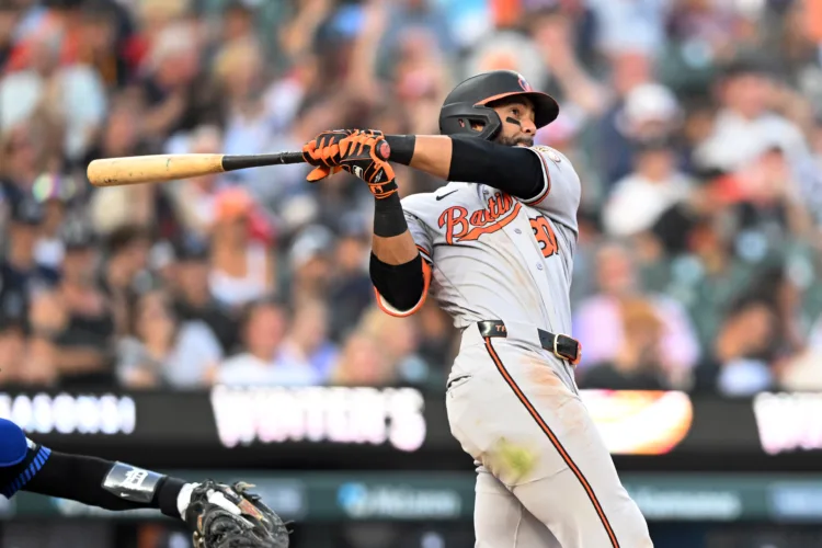 Holliday's 4 hits, Orioles' 3 homers leads to an 8-5 victory over the Tigers